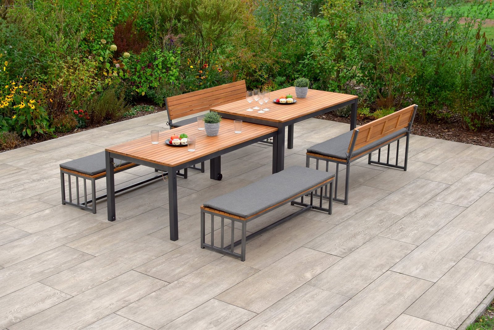 Garden dining group 10 pieces benches tables on site view